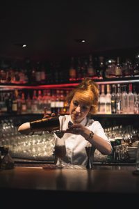 Woman Serving Cocktails